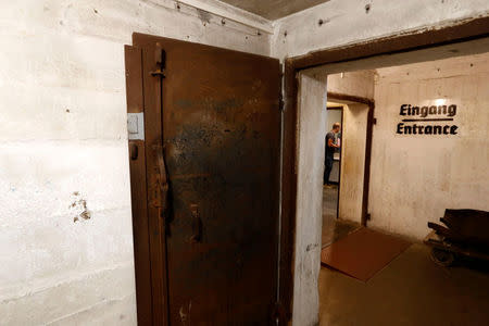 An entrance to the exhibition entitled 'Hitler - How Could it Happen?' about German Nazi leader Adolf Hitler is pictured during a media tour in a World War Two bunker in Berlin, Germany, July 27, 2017. REUTERS/Fabrizio Bensch