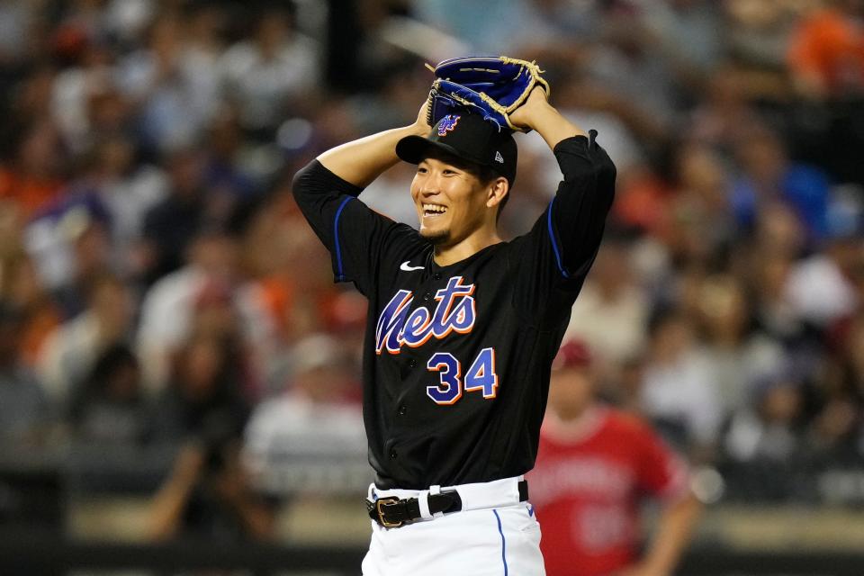 New York Mets starting pitcher Kodai Senga smiles before leaving during the seventh inning against the Los Angeles Angels, Friday, Aug. 25, 2023, in New York. (AP Photo/Frank Franklin II)