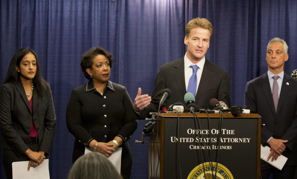 U.S. Attorney Zachary T. Fardon of the Northern District of Illinois speaks during a news conference accompanied by Principal Deputy Assistant Attorney General Vanita Gupta, left, Attorney General Loretta Lynch, and Chicago Mayor Rahm Emanuel, Friday, Jan. 13, 2017, in Chicago. The U.S. Justice Department issued a scathing report on civil rights abuses by Chicago's police department over the years. The report released Friday alleges that institutional Chicago Police Department problems have led to serious civil rights violations, including racial bias and a tendency to use excessive force. (AP Photo/Teresa Crawford)
