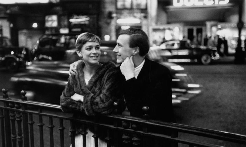 Terence Conran enjoys a night out in London with his wife, the journalist and author Shirley Conran, in June 1955.