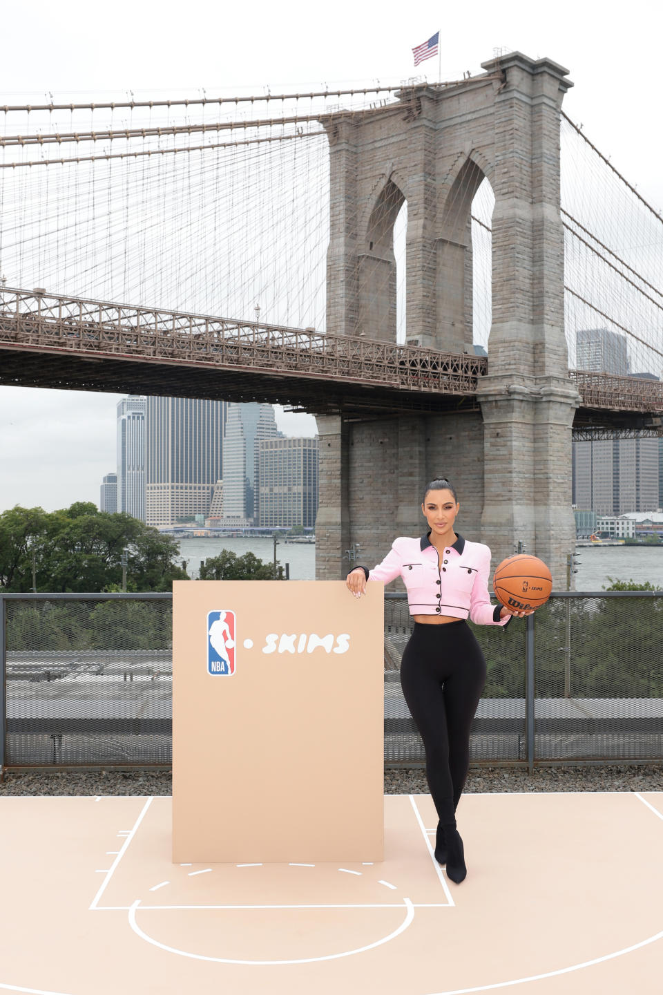 NEW YORK, NEW YORK - SEPTEMBER 28: Kim Kardashian poses at the announcement of SKIMS being named the official underwear partner of the NBA, WNBA, and USA Basketball on September 28, 2023 in New York City. (Photo by Dimitrios Kambouris/WireImage for SKIMS)