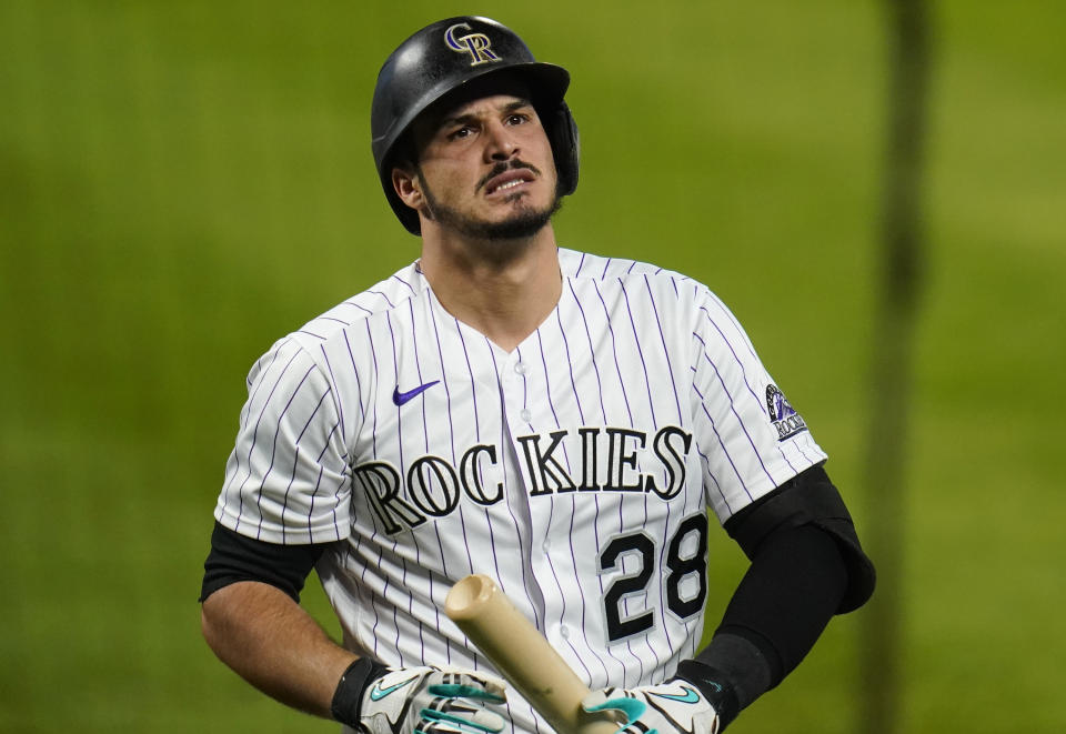 Colorado Rockies' Nolan Arenado reacts to striking out against the Oakland Athletics during the fourth inning of a baseball game Tuesday, Sept. 15, 2020, in Denver. (AP Photo/Jack Dempsey)