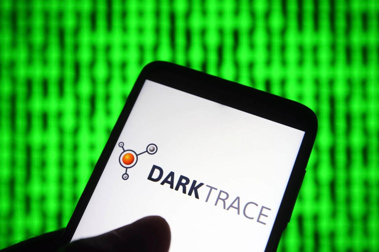 UKRAINE - 2021/07/15: In this photo illustration, Darktrace logo of a company that specialises in cyber defense is seen on a smartphone. (Photo Illustration by Pavlo Gonchar/SOPA Images/LightRocket via Getty Images)