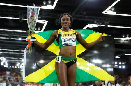 Elaine Thompson of Jamaica celebrates her bronze medal finish in the women's 60 meters final during the IAAF World Indoor Athletics Championships in Portland, Oregon in this March 19, 2016 file photo. REUTERS/Lucy Nicholson