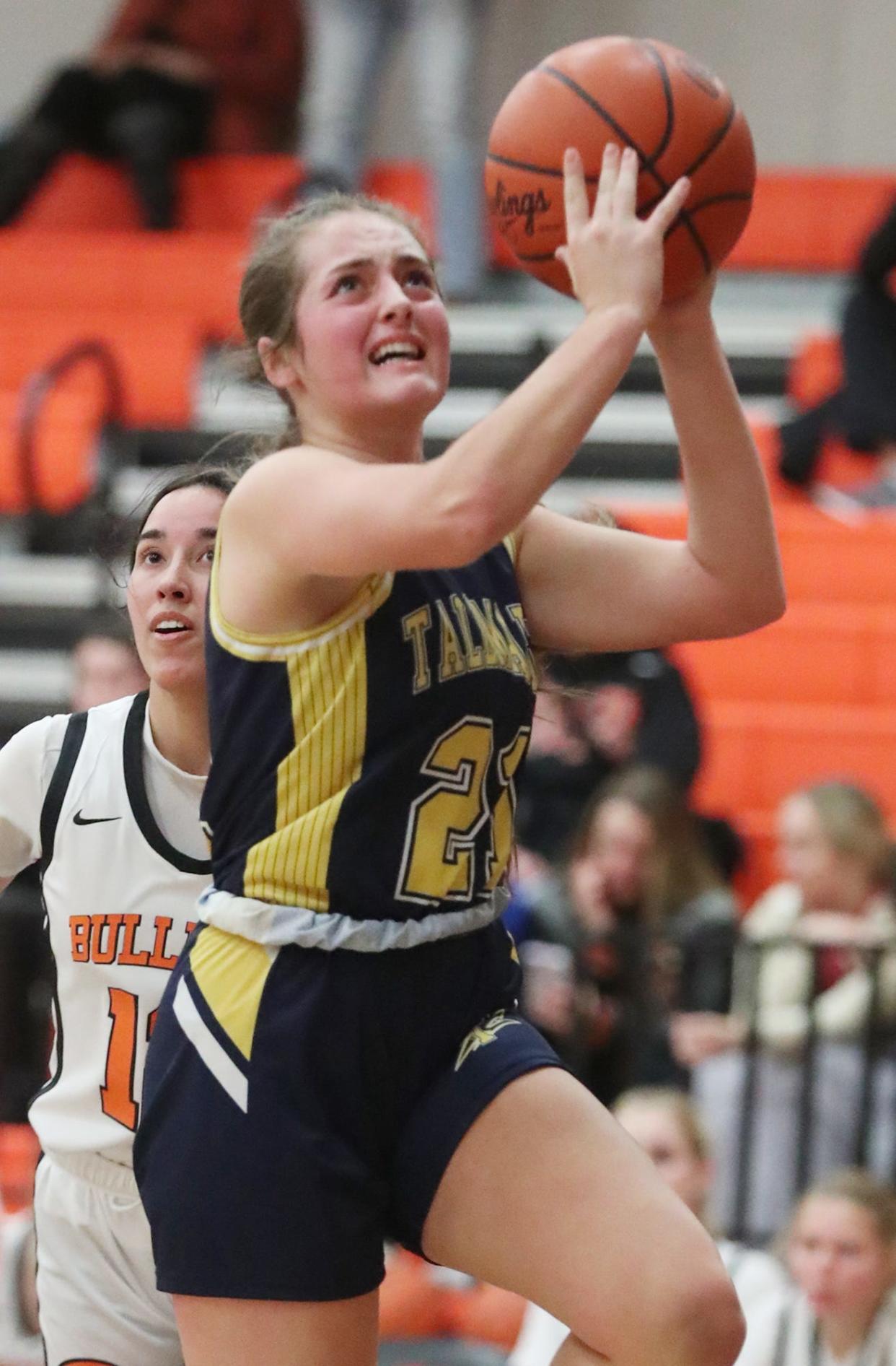 Tallmadge's Mia Zappola looks to shoot against Green in the first half of the game at Green High School. Green beat Tallmadge 72 to 28.