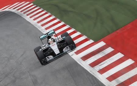 Mercedes Formula One driver Lewis Hamilton of Britain steers his car during the qualifying session for the Austrian F1 Grand Prix at the Red Bull Ring circuit in Spielberg, Austria, June 20, 2015. REUTERS/Leonhard Foeger