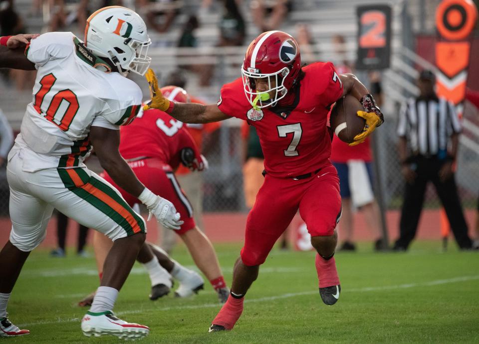 Andre Devine of North Fort Myers looks to get by Jaylon Christmas of Dunbar on Friday, Sept 1, 2023, in North Fort Myers.
