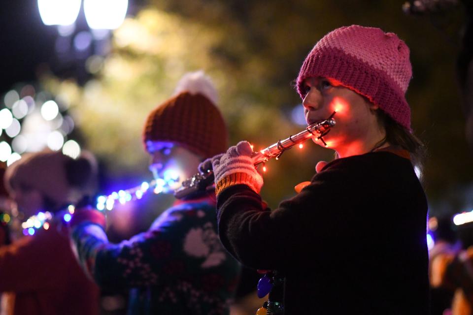 Scenes from the Silver Bells in the City Electric Light Parade in downtown Lansing, Friday, Nov. 19, 2021.