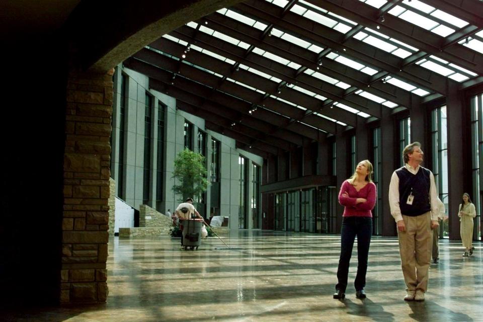 Country Music Hall of Fame director Kyle Young, right, led Patty Loveless on a two-hour tour of the new museum May 3, 2001. The grand opening celebration is May 17.