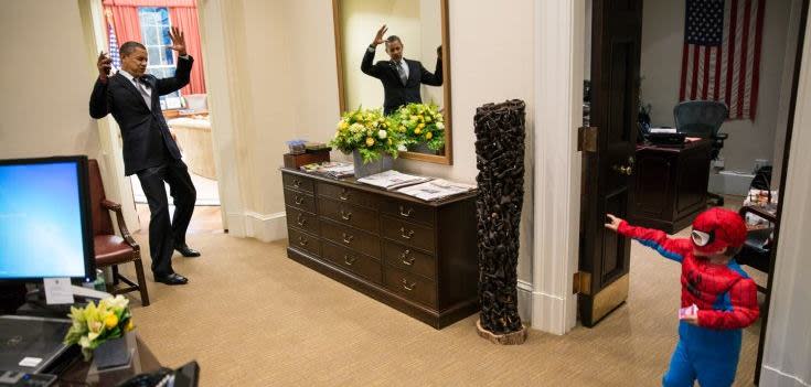 The US President Barack Obama, recently named Time's magazine Person of the Year, was pictured goofing around with a young visitor dressed as Spiderman. The picture went viral, within an hour of the picture being uploaded onto Obama's Facebook the photo received more than 300,000 'likes' (Pete Souza/White House)