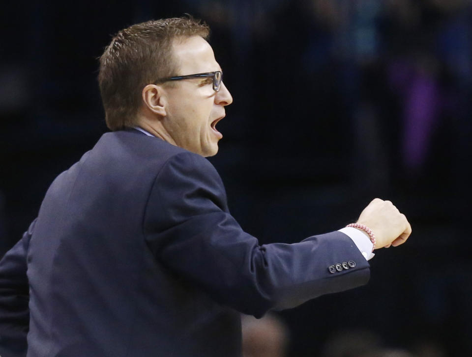 Oklahoma City Thunder coach Scott Brooks shouts during the fourth quarter of an NBA basketball game against the Cleveland Cavaliers in Oklahoma City, Wednesday, Feb. 26, 2014. Cleveland won 114-104. (AP Photo/Sue Ogrocki)