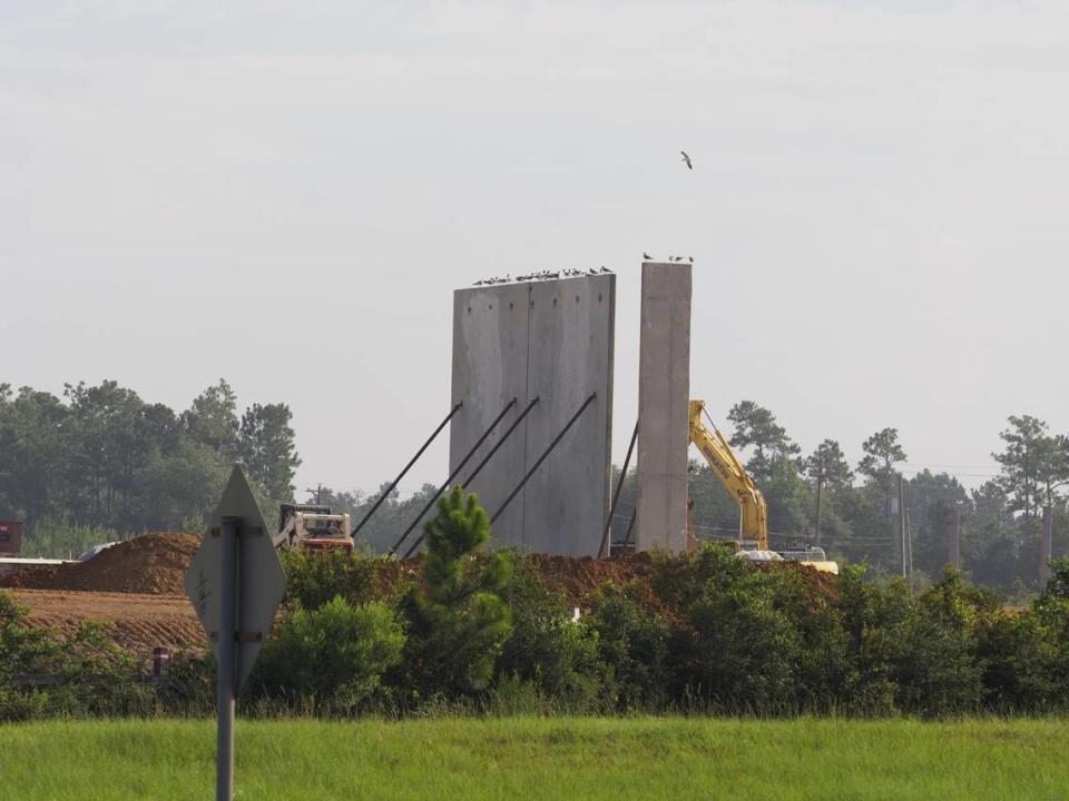 Just in time for the July 4 travel weekend, a crane lifts the precast concrete walls of the the Buc-ee’s travel center under construction along I-10 near Gulfport, MS. The travel center is expected to open early in 2025 and has begun hiring managers.