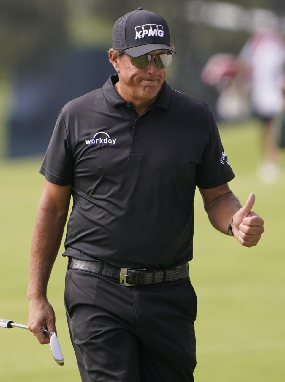 Phil Mickelson gives a thumbs up to fans on the 10th fairway during the second round of the U.S. Open Golf Championship, Friday, June 18, 2021, at Torrey Pines Golf Course in San Diego. (AP Photo/Jae C. Hong)