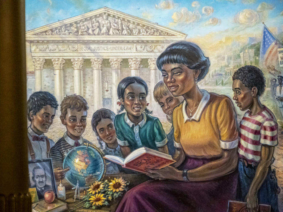  A section of the Brown v. Board mural is seen on April 2, 2024, at the Kansas Statehouse. The mural appears outside the former Kansas Supreme Court room where 11 state cases seeking to end segregation of public schools were argued and rejected before the federal case struck down segregation in public education. (Photo by Sherman Smith/Kansas Reflector)