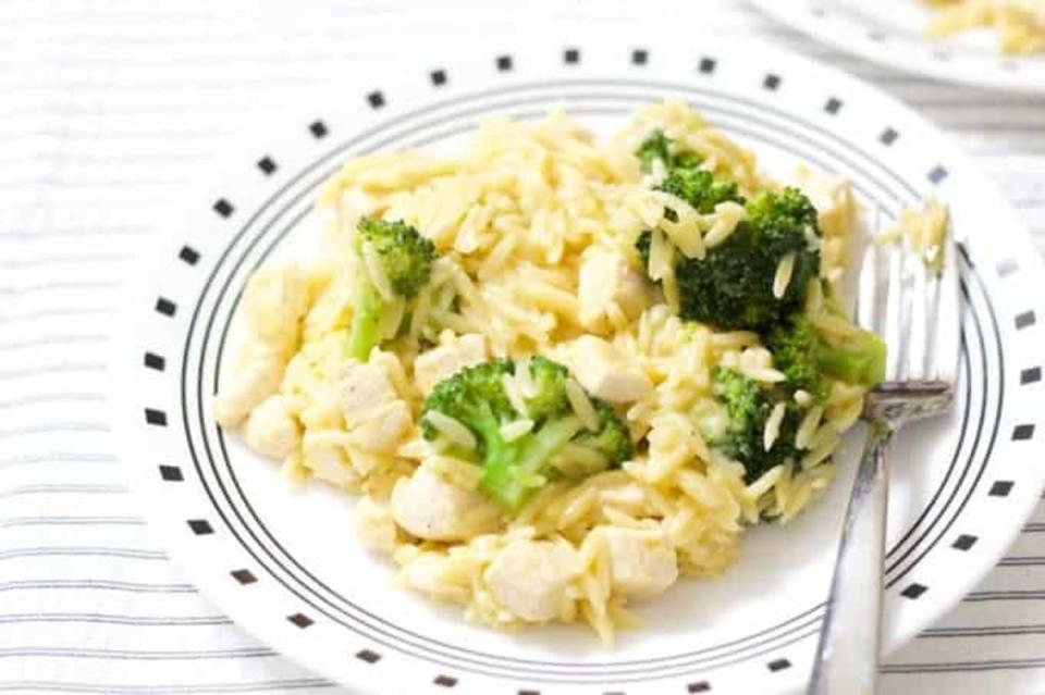 <p>With only 7 simple ingredients, this orzo dish will instantly become one of your go-to weeknight dinners. </p><p><strong>G</strong><strong>et the recipe: </strong><a href="https://www.mindyscookingobsession.com/cheesy-chicken-broccoli-orzo/?fbclid=IwAR224lUe-999Khfrr1d_rCv1N1b6xxfXAP-JS4JdqK2N16CW_i3apg7_u9I" rel="nofollow noopener" target="_blank" data-ylk="slk:Cheesy Chicken and Broccoli Orzo;elm:context_link;itc:0;sec:content-canvas" class="link "><strong>Cheesy Chicken and Broccoli Orzo</strong></a></p>