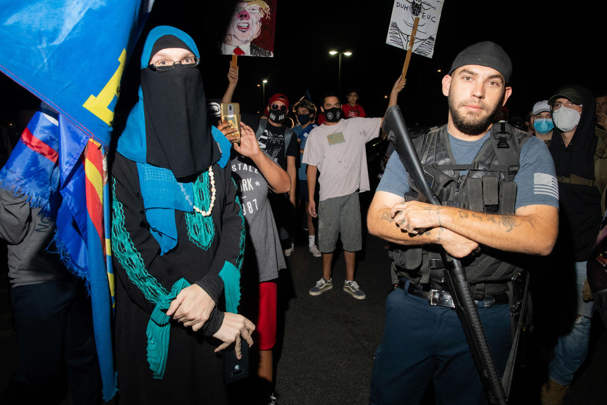 Trump supporters with counter protesters at the Mariscopa County Elections Office in Phoenix, AZ on November 4, 2020