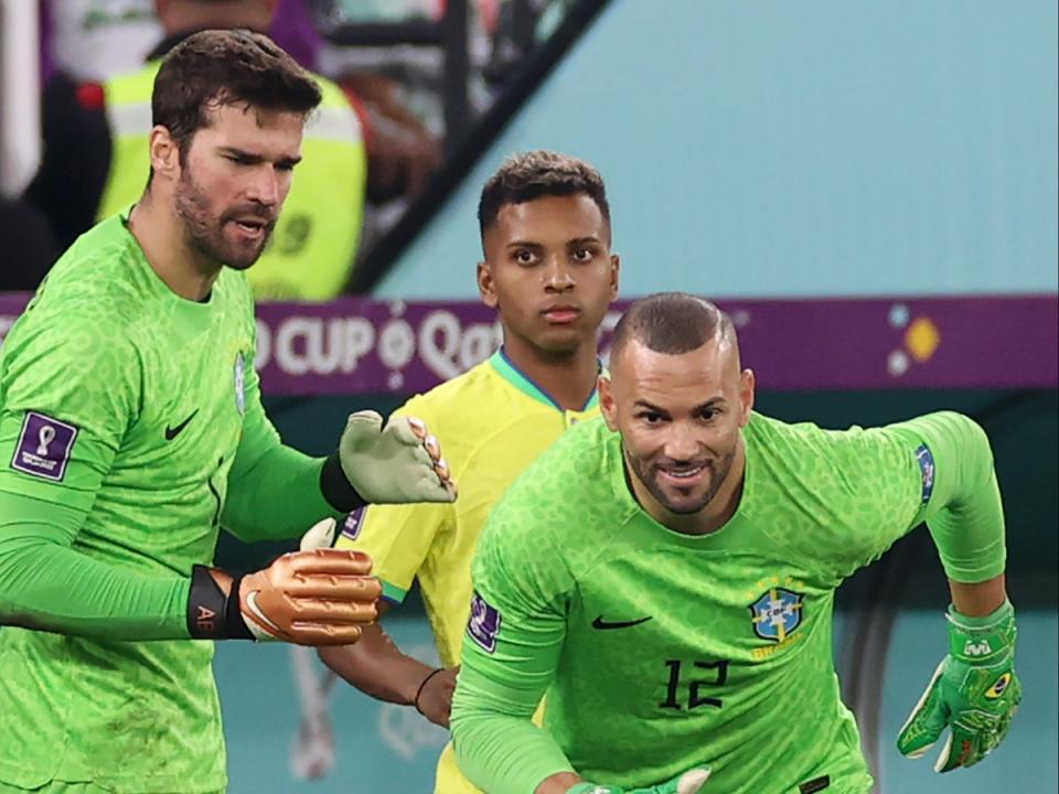 Weverton (right) replaces Alisson (left) for the last 10 minutes (Getty Images)