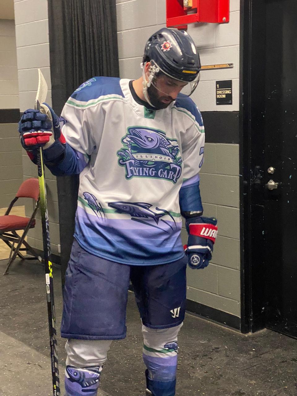 Illinois Flying Carp center Joe Drapluk is ready to go as the team re-brands from the Peoria Rivermen for one night and beats Quad City, 3-2, on March 10, 2023 at Carver Arena.