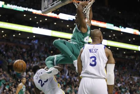 Nov 16, 2017; Boston, MA, USA; Boston Celtics forward Al Horford (42) makes the basket over Golden State Warriors forward Draymond Green (23) in the second half at TD Garden. Mandatory Credit: David Butler II-USA TODAY Sports