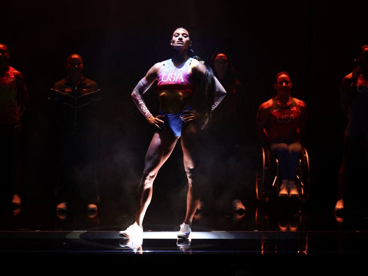 U.S. Olympian Anna Cockrell poses Thursday during the unveiling of the new Nike athletics kit for the 2024 Olympics at an event in Paris. The women's track uniform has received backlash for its high cut bikini line, reigniting  longstanding criticisms of sexism in sporting uniforms. (Stephanie Lecocq/Reuters - image credit)