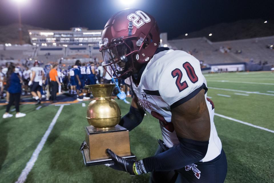 NMSU celebrates their 28-7 win against UTEP at the 100th Battle of I-10 rivalry game on Wednesday, Oct. 18, 2023, at the Sun Bowl.