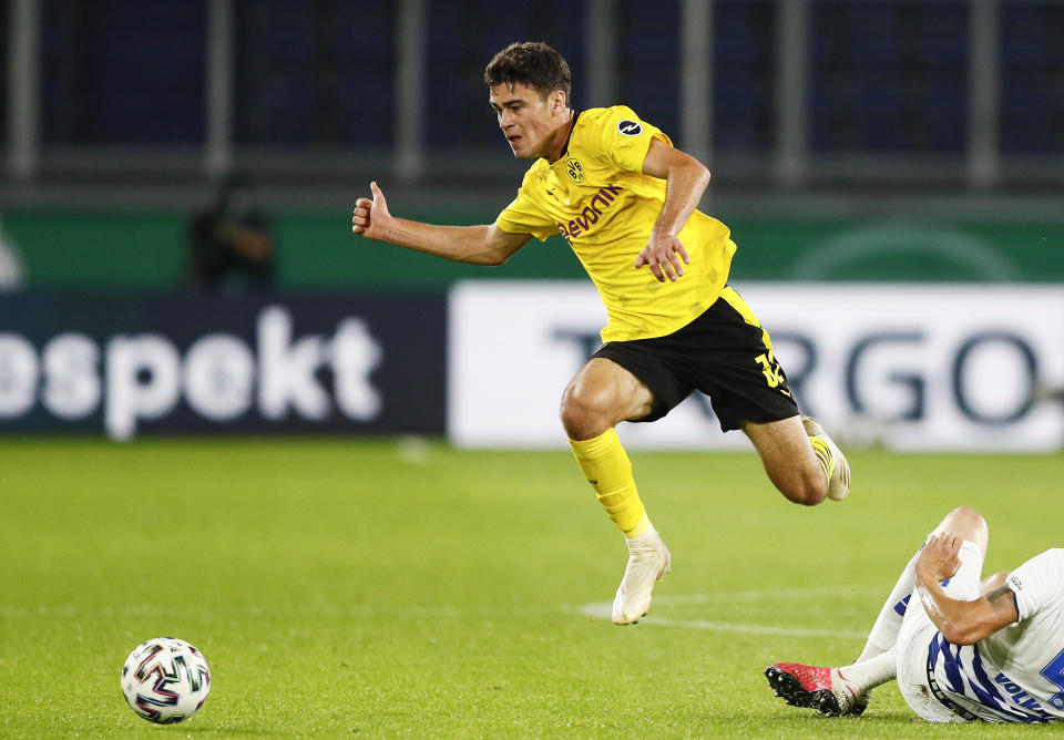 FILE - In this Sept. 14, 2020, file photo, Dortmund's Giovanni Reyna plays during a first round German Soccer Cup match against MSV Duisburg in Duisburg, Germany. Gio Reyna, a son of former U.S. captain Claudio Reyna, got his first call-up to the U.S. national soccer team. The Borussia Dortmund midfielder is part of a 24-man roster for exhibitions at Wales on Nov. 12 and against Panama four days later in Austria. (AP Photo/Martin Meissner, File)