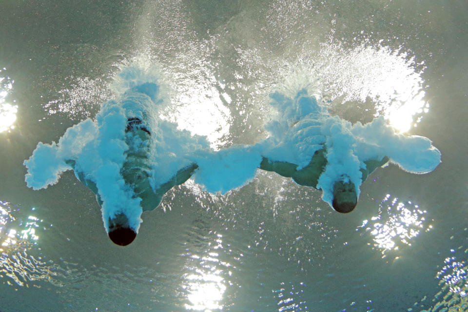 LONDON, ENGLAND - JULY 30: Jose Antonio Guerra and Jeinkler Aguirre of Cuba compete in the Men's Synchronised 10m Platform Diving on Day 3 of the London 2012 Olympic Games at the Aquatics Centre on July 30, 2012 in London, England. (Photo by Adam Pretty/Getty Images)