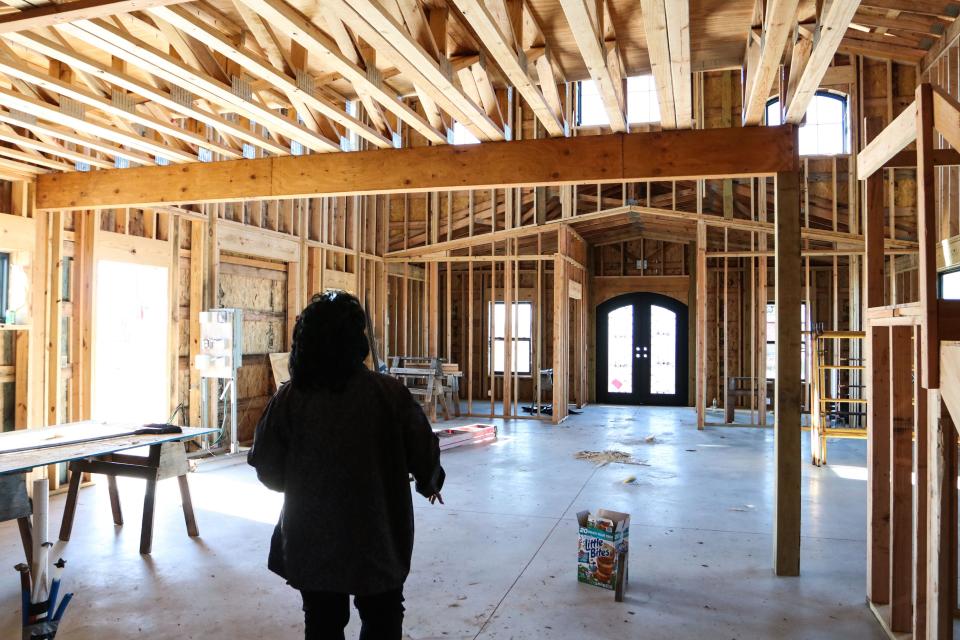 Teresa Rutherford walks through the home she is building on the Osage Nation Reservation in northeastern Oklahoma. Getting a tax exemption from the state of Oklahoma for sales and use tax on the construction has proved challenging.