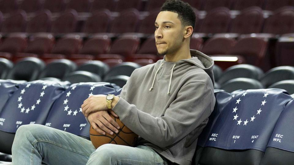 Ben Simmons (pictured) sitting on the bench before a game.