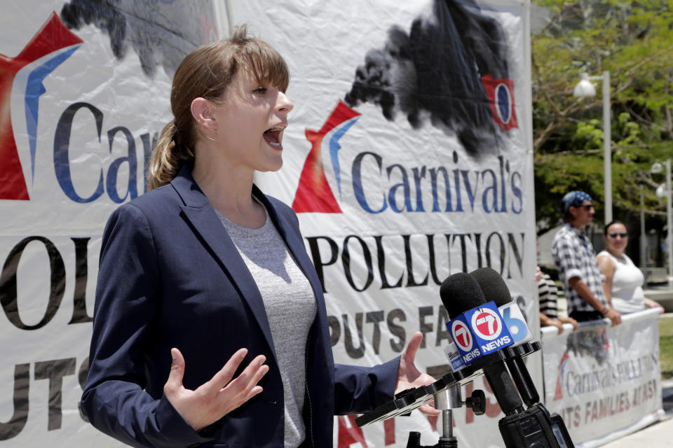 Kendra Ulrich, of Stand.earth, speaks outside of federal court, Monday, June 3, 2019, in Miami. Carnival Corp. is in federal court for a hearing on what to do about allegations that it has continued polluting the oceans from some of its cruise ships despite agreeing years ago to stop (AP Photo/Lynne Sladky)