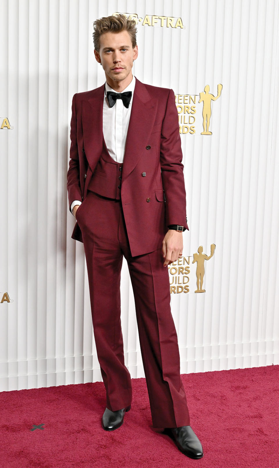 Sandra Amador styles Austin Butler, who donned burgundy Gucci at the SAG Awards in L.A. in February.
