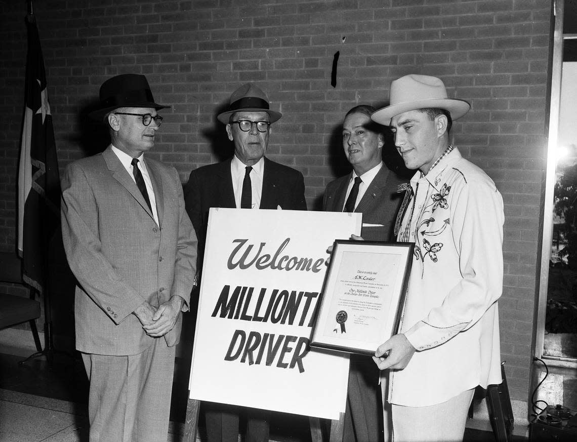 Nov. 8, 1957: E.W. Locker, right, was the 1 millionth customer on the Dallas-Fort Worth Turnpike and was awarded a plaque from J.C. Dingwall, left, W.O. Jones and J. D. Brewer.