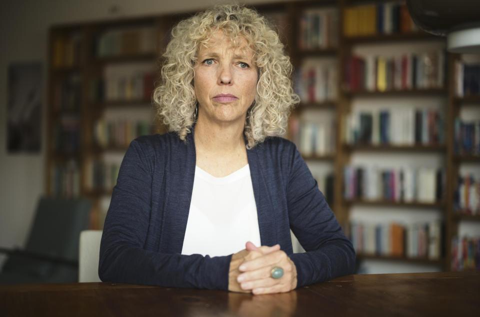 Jennifer Morgan, Executive Director of the environment organization Greenpeace International poses for a photo during an interview with the Associated Press in Berlin, Germany, Thursday, Oct. 21, 2021. The head of environmental group Greenpeace warned against efforts by countries and corporations to “greenwash” their ongoing pollution of the planet at the upcoming U.N. climate talks. Morgan said leaked documents show how countries such as Australia, Brazil and Saudi Arabia recently tried to water down a U.N. science panel report on global warming. (AP Photo/Markus Schreiber)