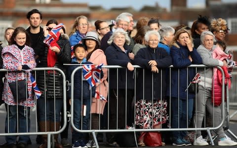 Crowds gathered in Windsor for the royal wedding - Credit: Getty
