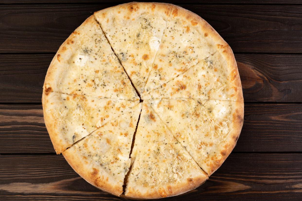 <p><br></p><p>Baltimore may not be the first city that comes to mind as a great pizza town, but it indeed has a pizza style all its own. Baltimore pizza has a thick, focaccia-like crust and a whole lot of melty, stretchy cheese. <a href="https://www.goldbelly.com/restaurants/matthews-pizza" rel="nofollow noopener" target="_blank" data-ylk="slk:Matthew’s;elm:context_link;itc:0;sec:content-canvas" class="link rapid-noclick-resp">Matthew’s</a> is the city’s oldest pizzeria, and its signature invention is topped with loads of fresh Maryland crab, a nod to the state’s position on the Chesapeake Bay.</p><span class="copyright"> Andrii Lysenko/Istockphoto </span>