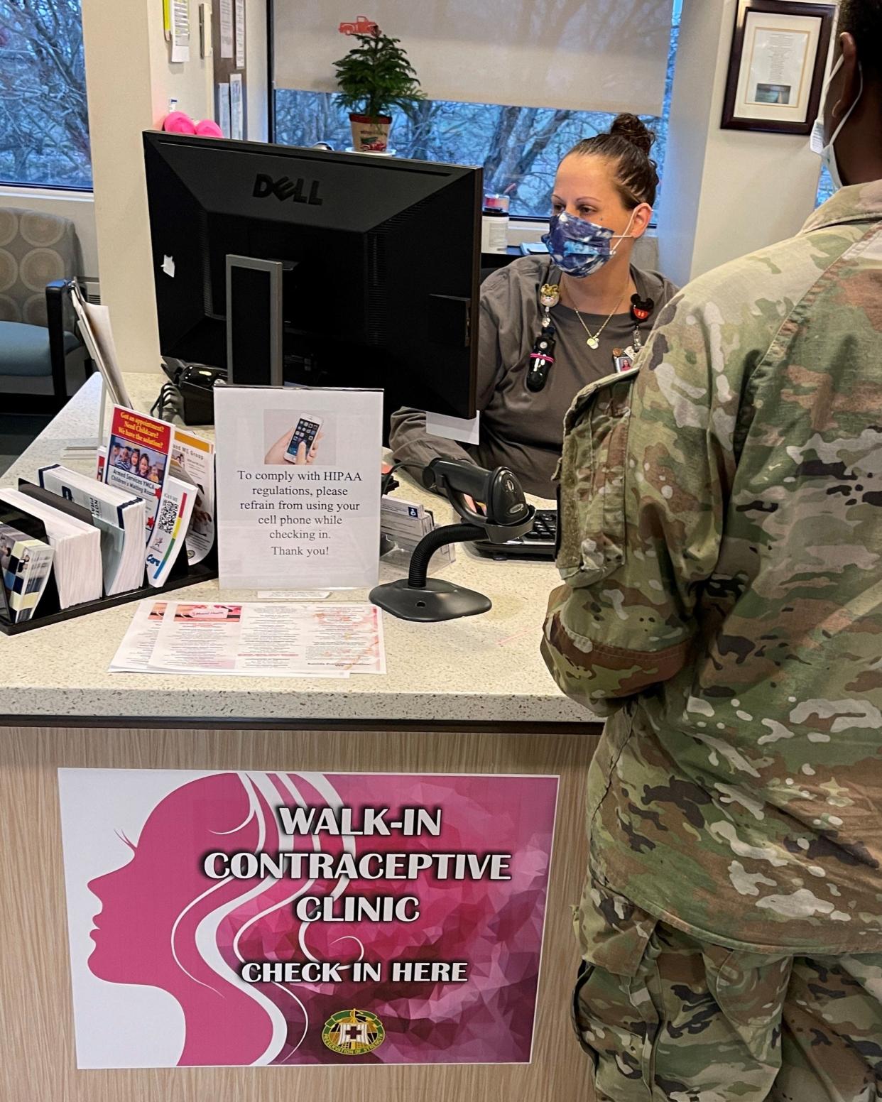 Blanchfield Army Community Hospital employee, Michele Willis, checks a soldier in for the Fort Campbell hospital’s weekly walk-in contraceptive clinic on Fort Campbell on Jan. 11. Services include contraception counseling, initial prescription or prescription refill, and IUD or implant placement or removal.