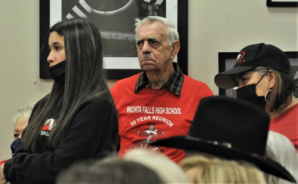 Audience members show their support by wearing Old High apparel during a Wichita Falls High School Board meeting on Tuesday, January 18, 2022, at the Education Center.