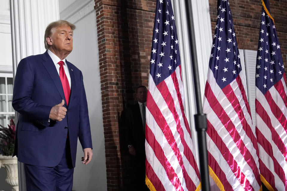 Former President Donald Trump arrives to speak at Trump National Golf Club in Bedminster, N.J., Tuesday, June 13, 2023, after pleading not guilty in a Miami courtroom earlier in the day to dozens of felony counts that he hoarded classified documents and refused government demands to give them back. (AP Photo/Andrew Harnik)