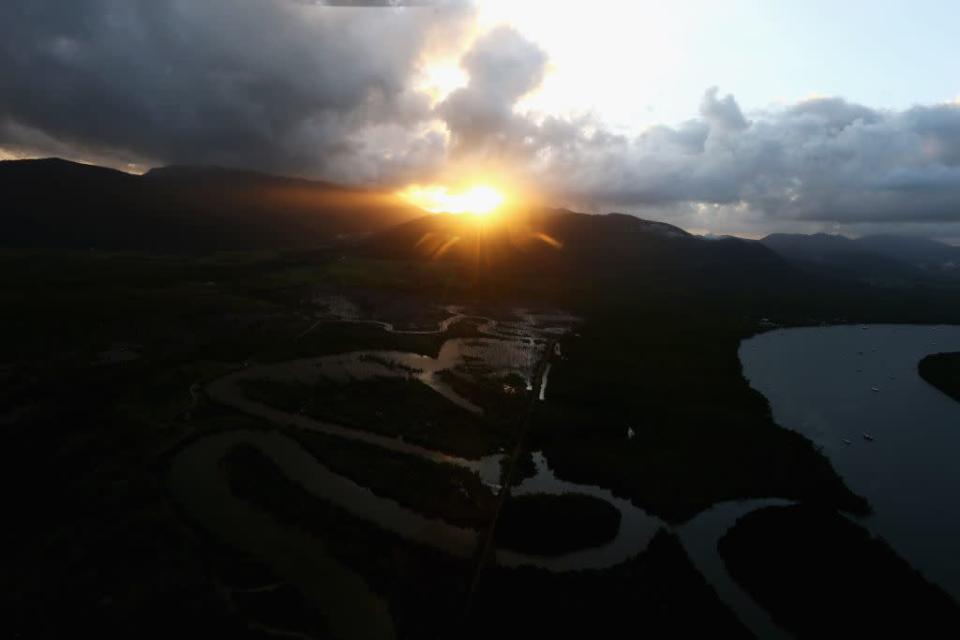 Sunrise is seen ahead of the solar eclipse in Palm Cove, Australia.