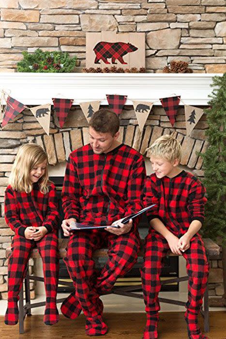 <p>Matching or coordinating holiday PJs, heralded in many-a family photo <a href="https://www.youtube.com/watch?v=2kjoUjOHjPI" rel="nofollow noopener" target="_blank" data-ylk="slk:and in song;elm:context_link;itc:0;sec:content-canvas" class="link ">and in song</a>, makes for an extra pop in Christmas photos. "My mom still gets way too excited to surprise us with matching PJs," says Blake Bakkila. (And she's not the only adult who's told us this!)</p><p> RELATED: <strong><a href="https://www.goodhousekeeping.com/holidays/christmas-ideas/g4946/matching-family-christmas-pajamas/" rel="nofollow noopener" target="_blank" data-ylk="slk:29 Best Matching Christmas Pajamas for the Whole Family (Including the Dog!);elm:context_link;itc:0;sec:content-canvas" class="link ">29 Best Matching Christmas Pajamas for the Whole Family (Including the Dog!)</a></strong></p>