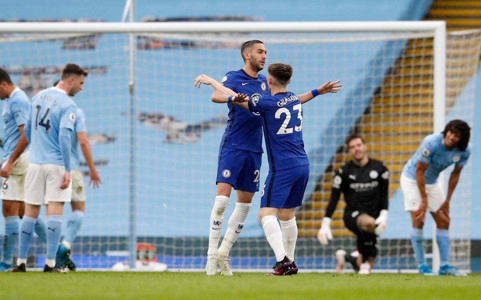 Chelsea's Hakim Ziyech celebrates scoring their first goal with Billy Gilmour  - Reuters