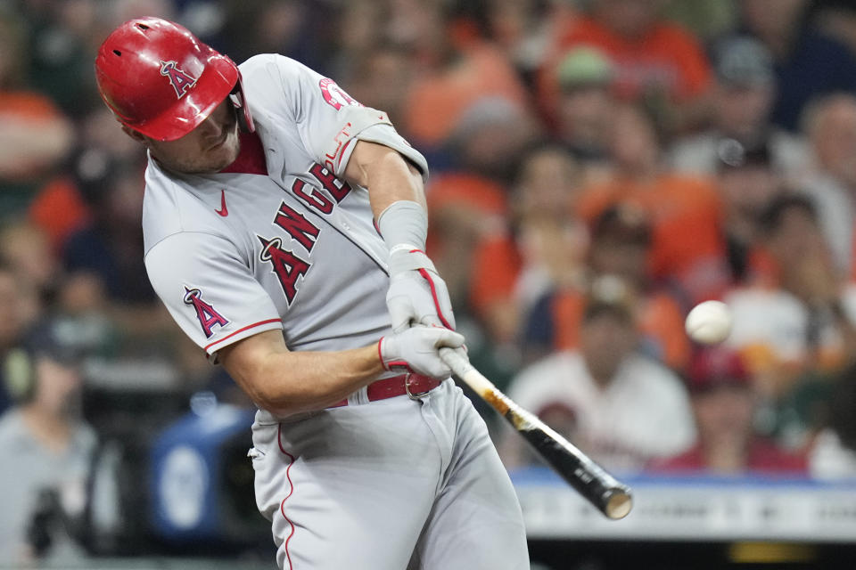 Los Angeles Angels' Mike Trout hits a three-run home run during the second inning of the team's baseball game against the Houston Astros, Saturday, Sept. 10, 2022, in Houston. (AP Photo/Eric Christian Smith)