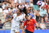 United States' forward Alex Morgan (L) vies with Spain's midfielder Andrea Sanchez Falcon during the France 2019 Women's World Cup round of sixteen football match between Spain and USA, on June 24, 2019, at the Auguste-Delaune stadium in Reims, northern France. (Photo by FRANCK FIFE / AFP) (Photo credit should read FRANCK FIFE/AFP/Getty Images)