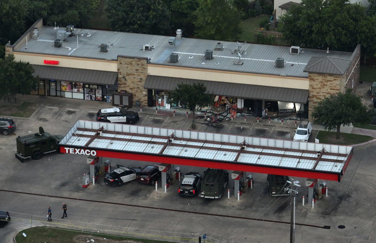 Police investigate at a fatal officer-involved shooting at a convenience store at Salt Springs Drive and Thaxton Road in southeast Austin Tuesday May 21, 2024.