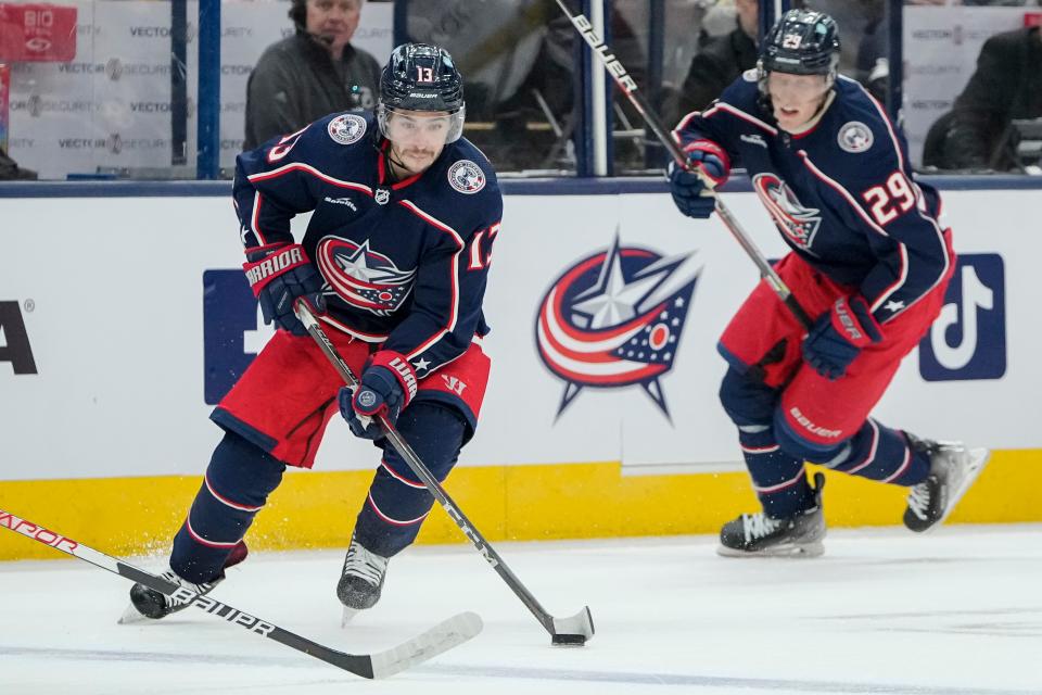 Oct 25, 2022; Columbus, Ohio, USA;  Columbus Blue Jackets left wing Johnny Gaudreau (13) brings the puck up ice ahead of left wing Patrik Laine (29) during the first period of the NHL hockey game against the Arizona Coyotes at Nationwide Arena. Mandatory Credit: Adam Cairns-The Columbus Dispatch