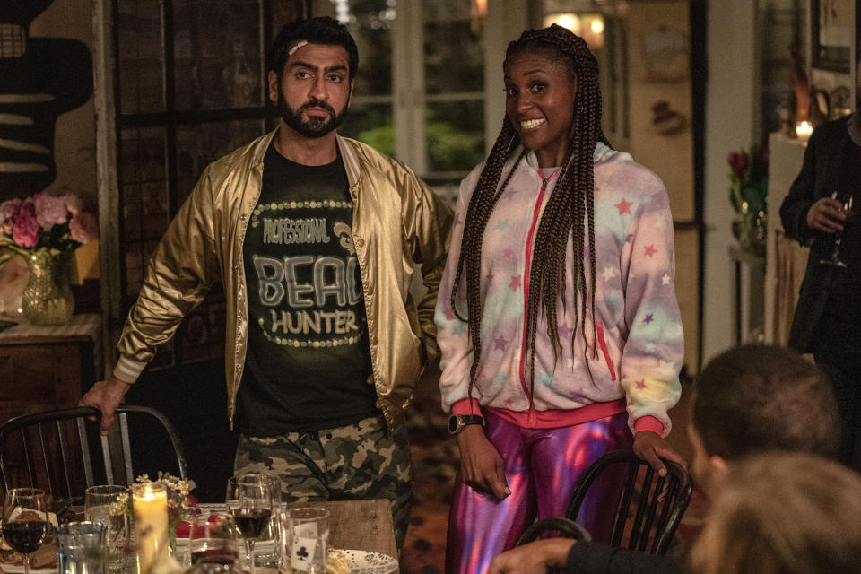 This image released by Netflix shows Issa Rae as Leilani, right, and Kumail Nanjiana as Jibran in a scene from "The Lovebirds." (Skip Bolen/Netflix via AP)