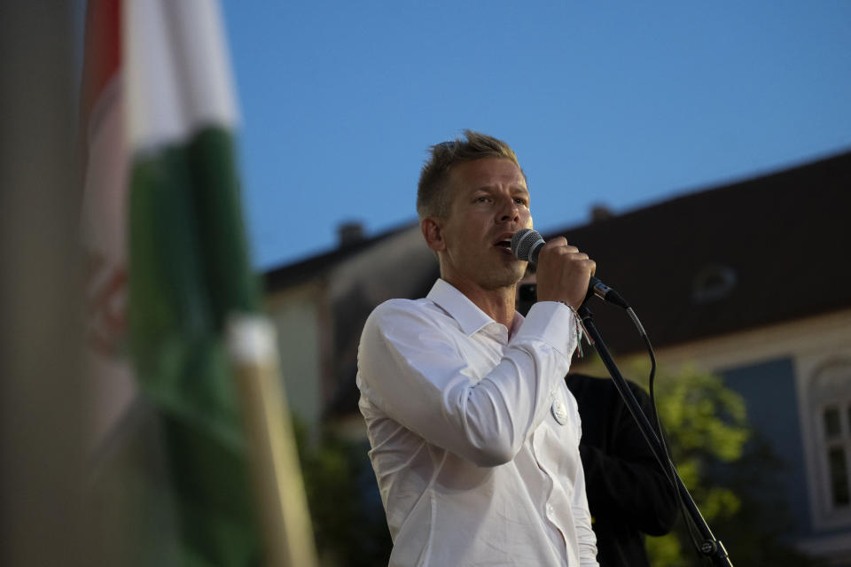 Péter Magyar, a former Fidesz insider that broke ranks with the party in February, addresses people at a campaign rally in Vac, Hungary, on May 18, 2024. Magyar, 43, seized on growing disenchantment with the populist Prime Minister Viktor Orbán, building a political movement that in only a matter of weeks looks poised to become Hungary's largest opposition force. (AP Photo/Denes Erdos)