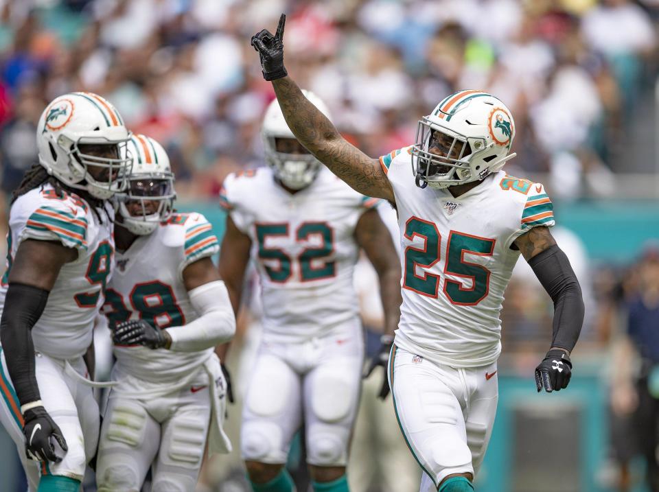 Miami Dolphins cornerback Xavien Howard celebrates after a stop against the New England Patriots.