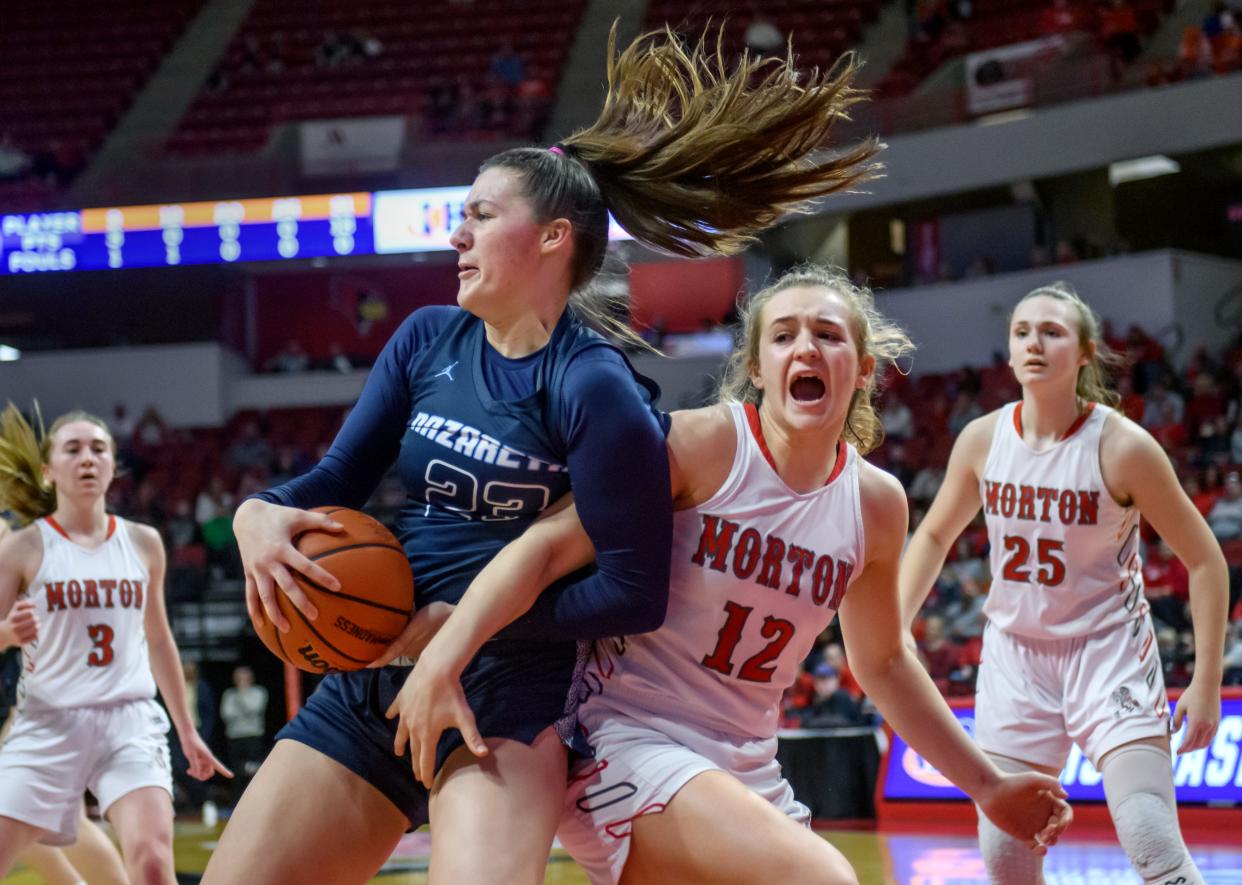 Morton's Tatym Lamprecht, right, and Nazareth Academy's Danielle Scully get tangled up on a rebound attempt in the first half of their Class 3A state semifinals Friday, March 4, 2022 at Redbird Arena in Normal. The Potters fell to the Roadrunners 55-24.