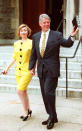 <p>Shining bright in a bright yellow outfit, Hillary waved to reporters outside of United Foundry Methodist. (Photo: JOSHUA ROBERTS/AFP/Getty Images) </p>